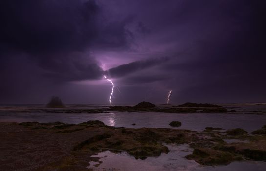 Lightning, heavy clouds and rain stormy weather