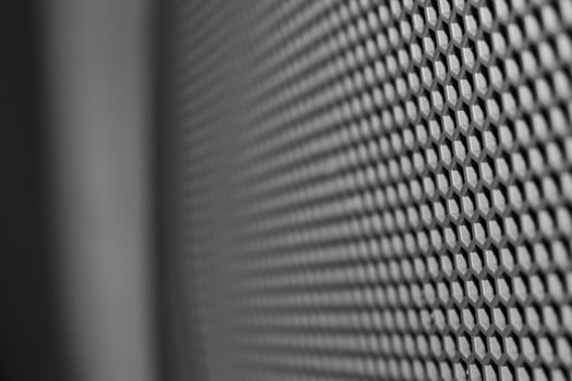 Speaker grid from side and close up, macro. Shallow depth of field.