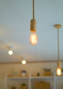 An incandescent light bulb, incandescent lamp or incandescent light globe is an electric light with a wire filament heated to such a high temperature that it glows with visible light (incandescence).