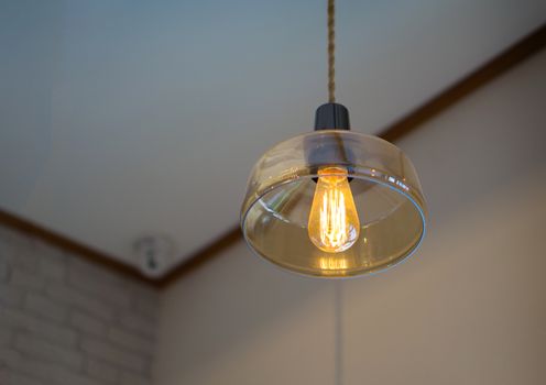 An incandescent light bulb, incandescent lamp or incandescent light globe is an electric light with a wire filament heated to such a high temperature that it glows with visible light (incandescence).