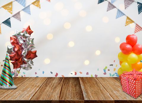 Background of Wood table top on colorful bokeh at night for New Year 2018 and Merry Christmas Celebration.