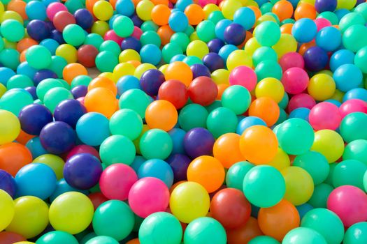 Colorful plastic balls for children playing in playground room.