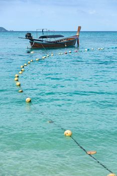 Long-tailed boat on Sunrise Beach, Koh LIPE, Satun, Thailand.