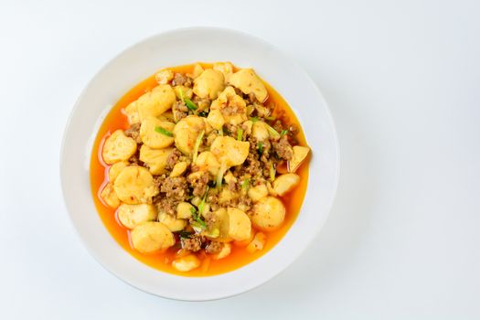 Mapo Tofu, popular Chinese dish.  The classic recipe consists of silken tofu, ground pork or beef and Sichuan peppercorn to name a few main ingredients.
