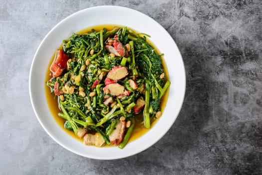 Fried water spinach with barbecued red pork
