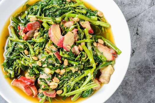 Fried water spinach with barbecued red pork
