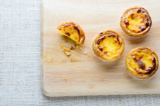 Portuguese Egg Tarts, is a kind of custard tart found in various Asian countries. The dish consists of an outer pastry crust and is filled with egg custard and baked.
