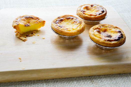 Portuguese Egg Tarts, is a kind of custard tart found in various Asian countries. The dish consists of an outer pastry crust and is filled with egg custard and baked.
