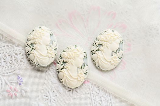 Antique cameo with ladies face, cameo brooch representing the side portrait of a woman
