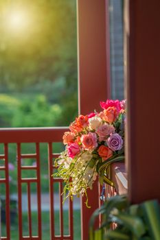 Rose and warm light in garden background , beautiful moments of love and happy life.
