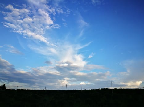 Blue sky with clouds, blue sky background. 
