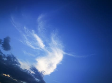 Blue sky with clouds, blue sky background. 
