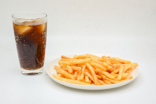 French fries on white dish and white background.