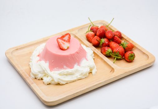 Italian dessert Pana Cotta with strawberries