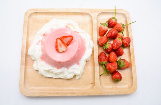 Italian dessert Pana Cotta with strawberries