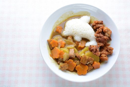 Japanese curry with dolphin rice shape and fried chicken. (Karaage)
