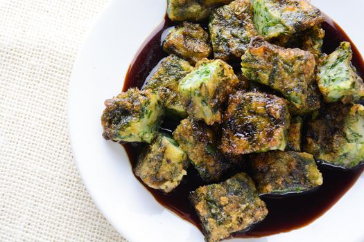 Deep fried Chinese Chive Dumplings (Kanom Gui Chai or Ku Chai Kuih), make for a great healthy and light snack/appetizer, and consisting of chinese chives stuffed inside dumpling dough.