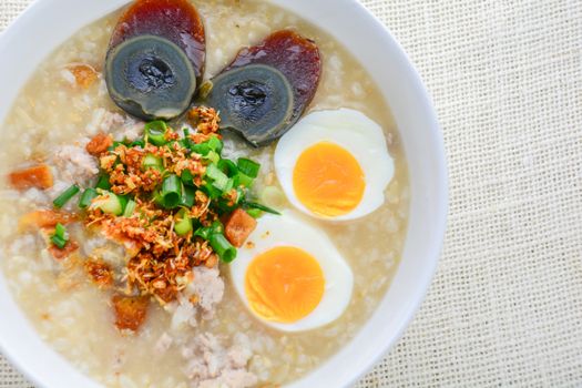 Congee, Rice porridge with minced pork, boiled egg and century egg, great for breakfast.