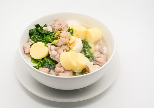 Boiled rice with pork, ivy gourd leaves and soft tofu