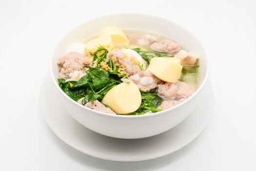 Boiled rice with pork, ivy gourd leaves and soft tofu