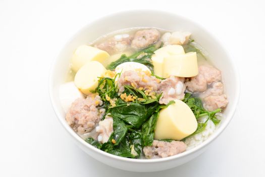 Boiled rice with pork, ivy gourd leaves and soft tofu