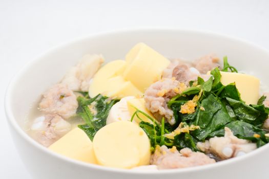 Boiled rice with pork, ivy gourd leaves and soft tofu