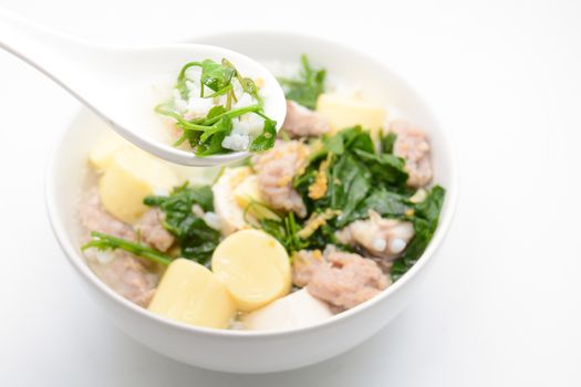 Boiled rice with pork, ivy gourd leaves and soft tofu