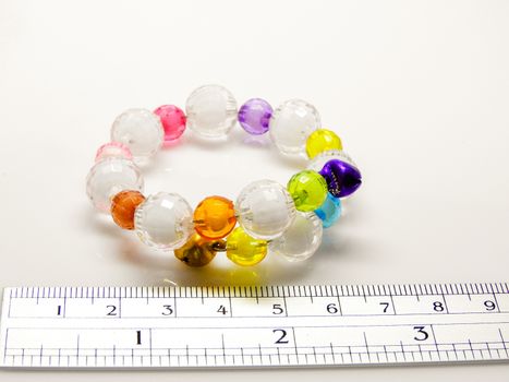 Multi-colored bracelets with beads. Colourful child's bead bracelet.
