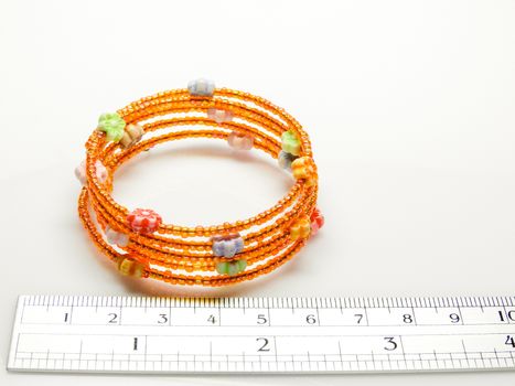 Multi-colored bracelets with beads. Colourful child's bead bracelet.
