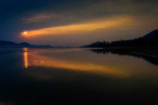 Sunrise over Mahanadi river, Odisha, Eastern Ghat mountain range, copy space