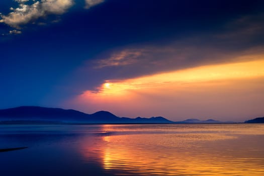Sunrise over Mahanadi river, Odisha, Eastern Ghat mountain range, copy space