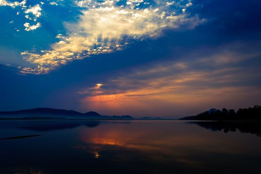 Sunrise over Mahanadi river, Odisha, Eastern Ghat mountain range, copy space