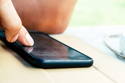 close up image of Phone on hands.