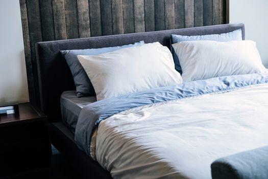 Modern white bed and pillow in the morning mood