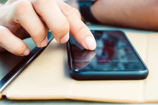 close up image of Phone on hands.