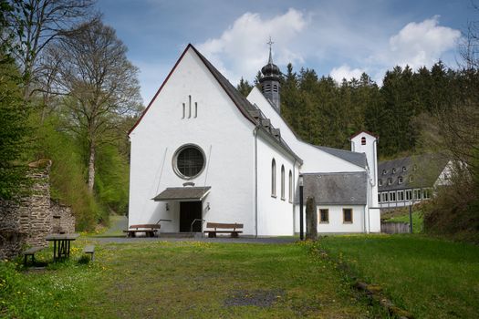 Panoramic image of the pilgrimage church of monastery Maria Martental close to Cochem on a sunny day, Germany