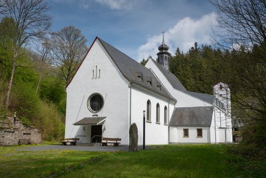 Panoramic image of the pilgrimage church of monastery Maria Martental close to Cochem on a sunny day, Germany