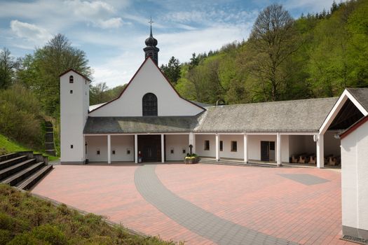 Panoramic image of the pilgrimage church of monastery Maria Martental close to Cochem on a sunny day, Germany