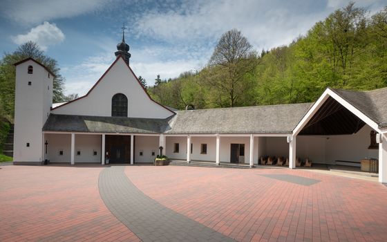 Panoramic image of the pilgrimage church of monastery Maria Martental close to Cochem on a sunny day, Germany