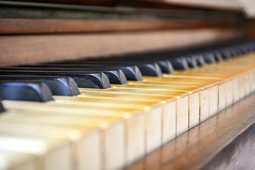 close-up view of the keys of a ancient ruined piano