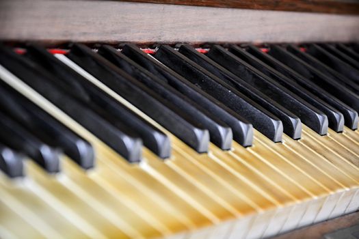 close-up view of the keys of a ancient ruined piano
