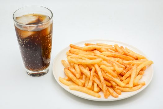 French fries on white dish and white background.