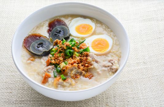 Congee, Rice porridge with minced pork, boiled egg and century egg, great for breakfast.