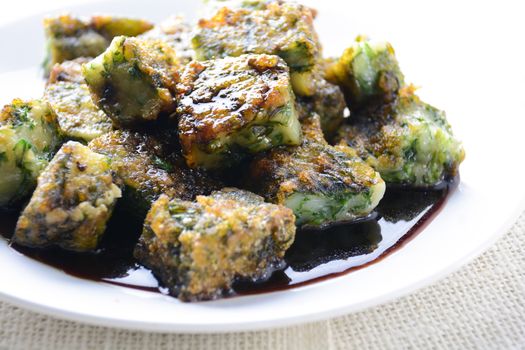 Deep fried Chinese Chive Dumplings (Kanom Gui Chai or Ku Chai Kuih), make for a great healthy and light snack/appetizer, and consisting of chinese chives stuffed inside dumpling dough.