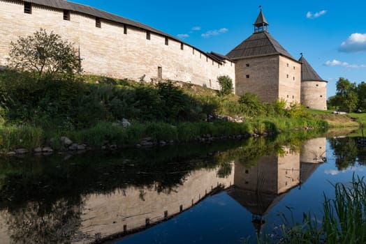 View to Elena river, Gate Tower and Klimentovskaya Tower of the Old Medieval Old Ladoga Fortress in Russia