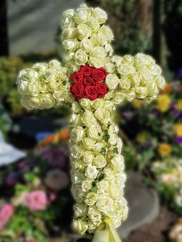 Cross of flowers of different colors. Decoration for different occasions