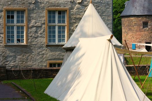 Reconstruction of a tent city, tent camp of the Middle Ages