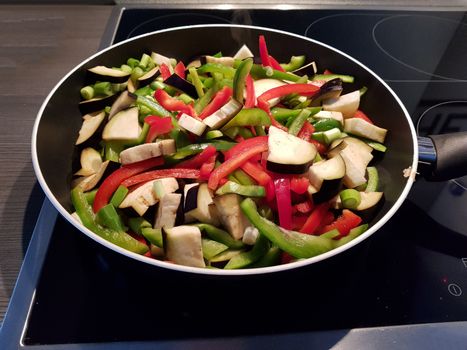 Grilled vegetables in a cast iron grill pan, top view