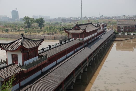 Old Chinese bridge with the roof