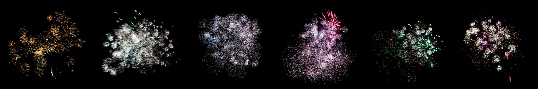 Set of multicolored flashes of fireworks isolated on black background.